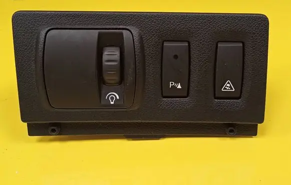 Headlight level height control switch