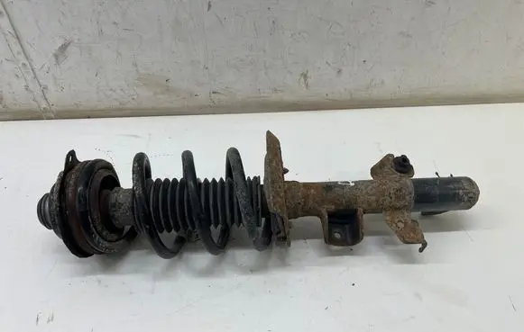 Jeep Cherokee Front shock absorber with coil spring 05168590AF