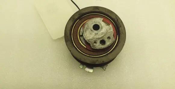 Volkswagen PASSAT B7 Belt tensioner pulley 03L109243