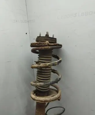 Front shock absorber with coil spring