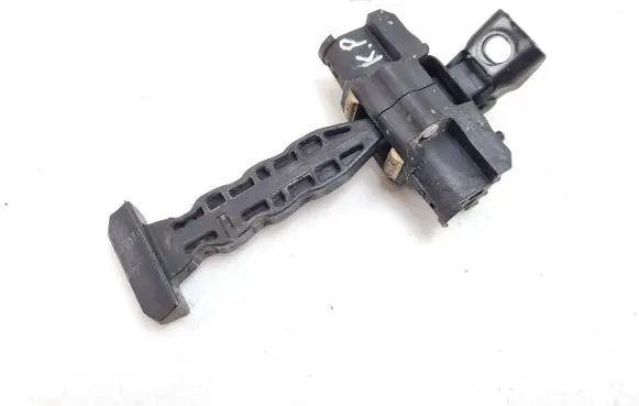 Front door check strap stopper