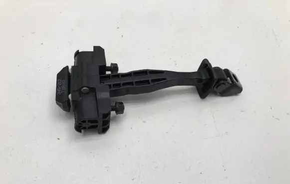 Rear door check strap stopper
