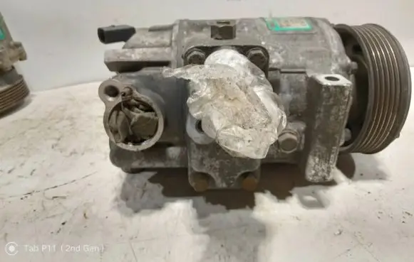 Volkswagen Golf V Air conditioning (A/C) compressor (pump) 1K0820803G 07117707464