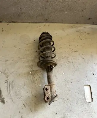 Toyota Yaris Front shock absorber with coil spring