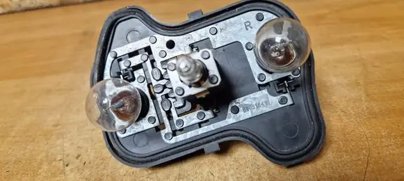 Volkswagen Golf V Tail light bulb cover holder 89031828