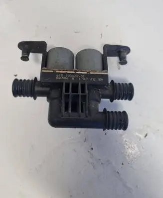 Coolant heater control valve