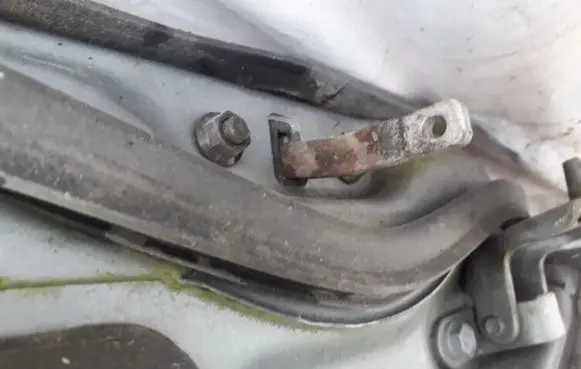 Mazda 323 Rear door check strap stopper