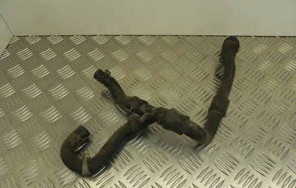 Volkswagen Golf VII Engine coolant pipe/hose 1K0034