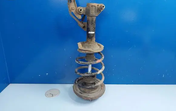 Nissan Primera Front shock absorber with coil spring 54302AV620