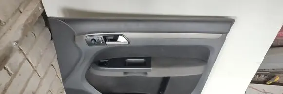Volkswagen Touran I Front door card panel trim 