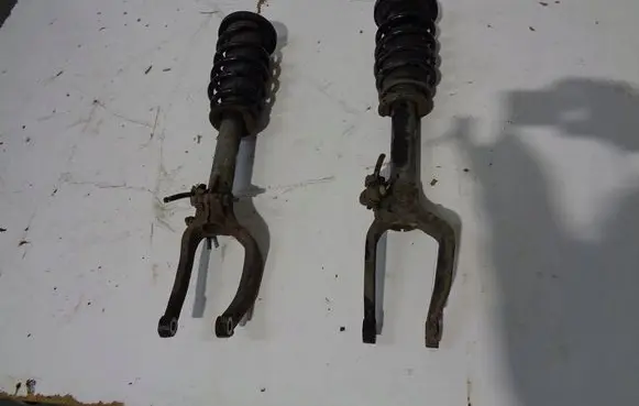 Alfa Romeo 159 Front shock absorber with coil spring MCPERSON