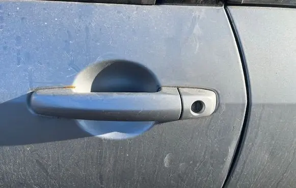 Suzuki Swift I Front door exterior handle 