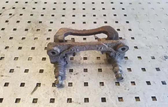 Subaru Outback Brake caliper pad carrier rear 