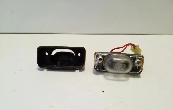 Subaru Outback Number plate light 0EW31