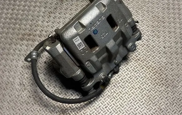 Subaru Legacy VII Front brake caliper 0F00A