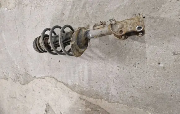 Front shock absorber with coil spring