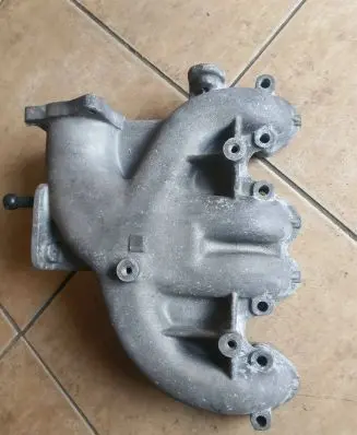 Volkswagen Golf IV Intake manifold 038129713AF