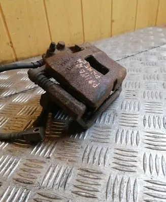 Nissan Primera Front brake caliper 25961