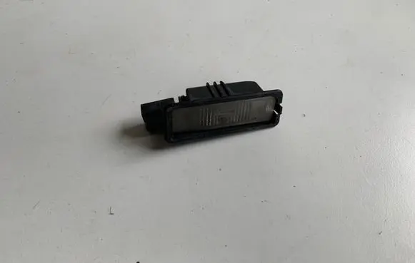 Volkswagen Scirocco Number plate light 1K8943021
