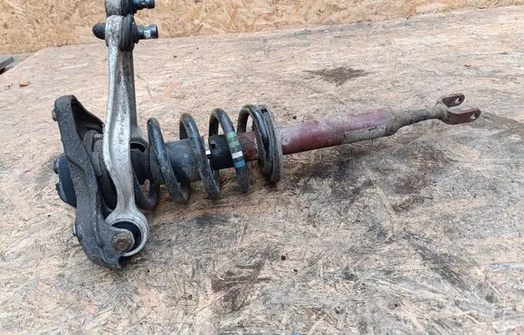 Front shock absorber with coil spring