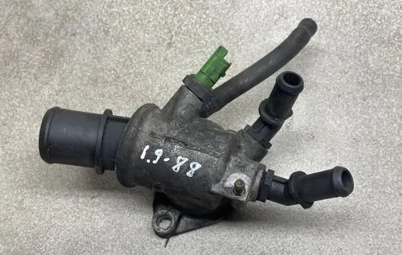 Thermostat/thermostat housing