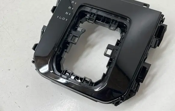Gear shifter surround trim plastic