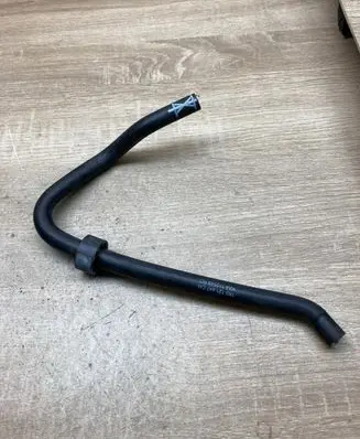 Volkswagen Touran I Engine coolant pipe/hose 1K0121447CM