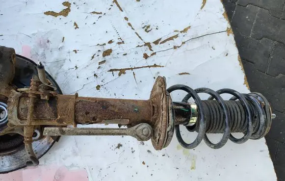 Toyota Yaris Front shock absorber with coil spring