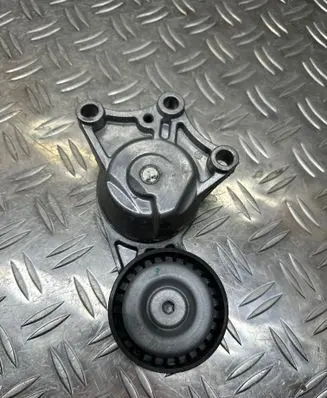Citroen C4 II Picasso Generator/alternator belt tensioner VKM33111
