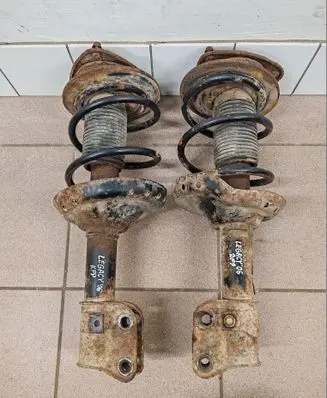 Front shock absorber with coil spring