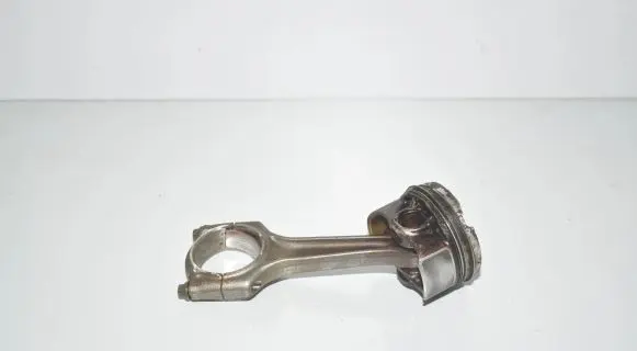 Piston with connecting rod
