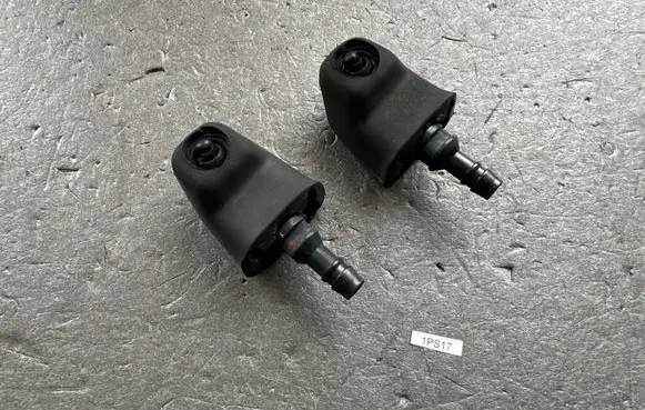 Mitsubishi Pajero Headlight washer nozzle holder MB314757