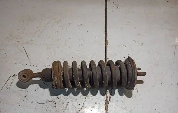 Nissan Navara D40 Front shock absorber with coil spring