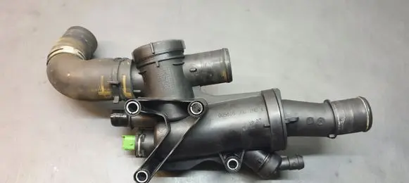 Thermostat/thermostat housing