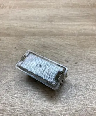 Renault Laguna I Number plate light 7700771935
