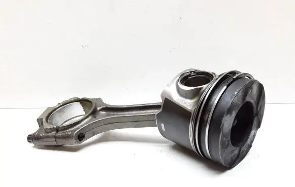 Piston with connecting rod