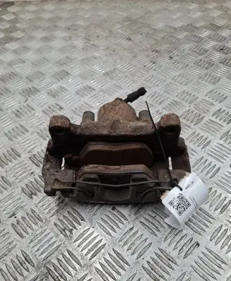 Volkswagen PASSAT B7 Front brake caliper