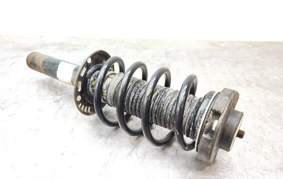 Volkswagen Caddy Front shock absorber with coil spring 317575 0120315 824904013020
