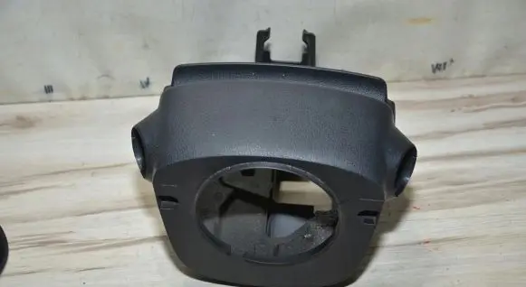 Nissan Note (E12) Steering wheel column trim