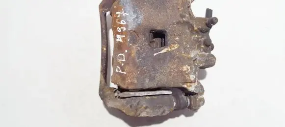 Nissan Juke I F15 Front brake caliper