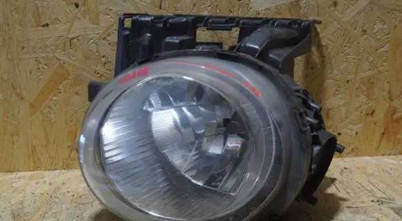 Nissan Juke I F15 Headlight/headlamp