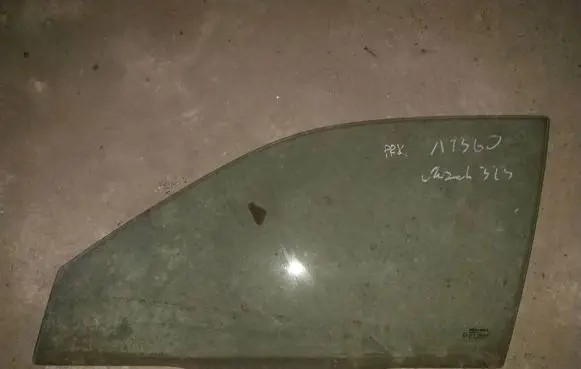 Mazda 323 F Front door window glass four-door