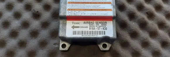 Mazda 323 F Airbag control unit/module B16A57K30