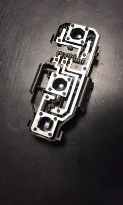Tail light bulb cover holder