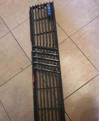 Fiat Uno Front bumper upper radiator grill 45642 A255