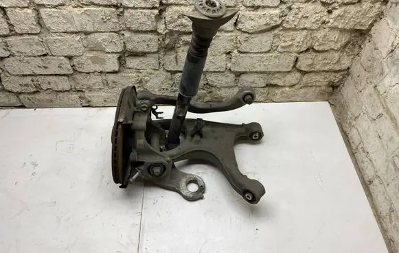 Rear wheel hub spindle/knuckle