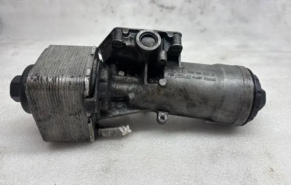 Volkswagen Caddy Oil filter mounting bracket 045115389J