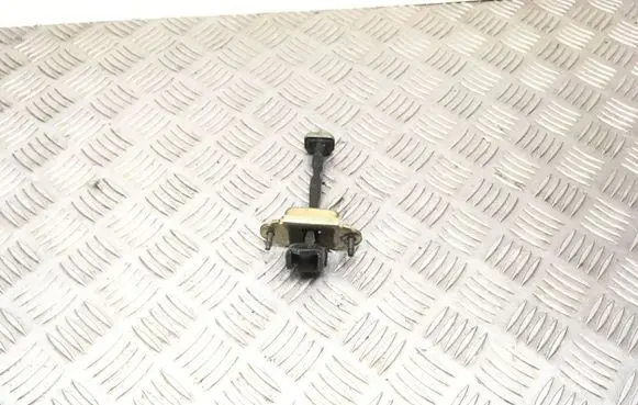 Front door check strap stopper
