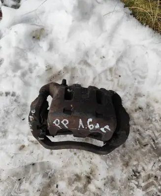 Nissan Qashqai+2 Front brake caliper 