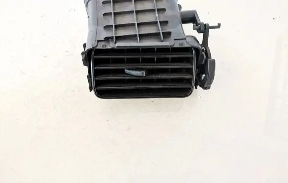 Mitsubishi Lancer Dash center air vent grill spc00773